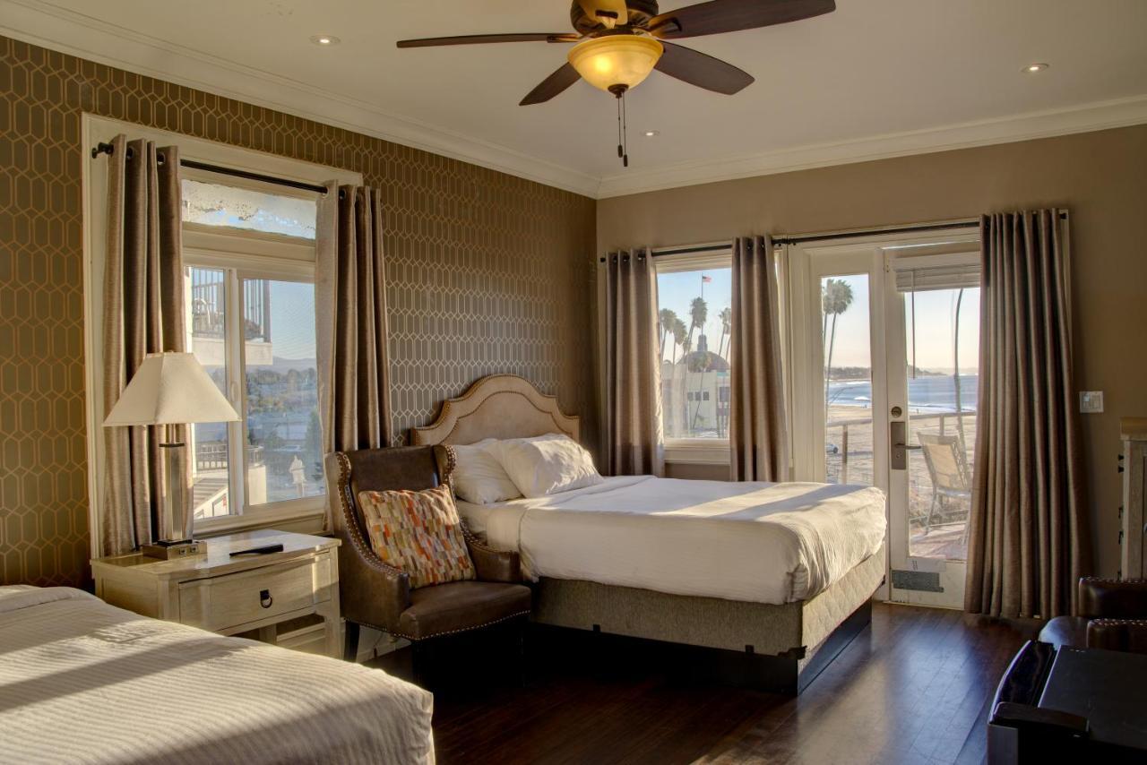 Partial Ocean View Two Queen Beds Shared Patio,1706853413:JPEG