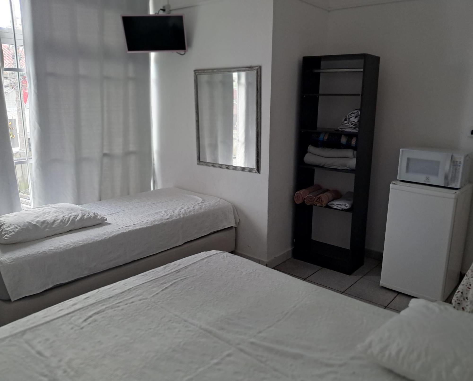 Quarto Família (3 Adultos)