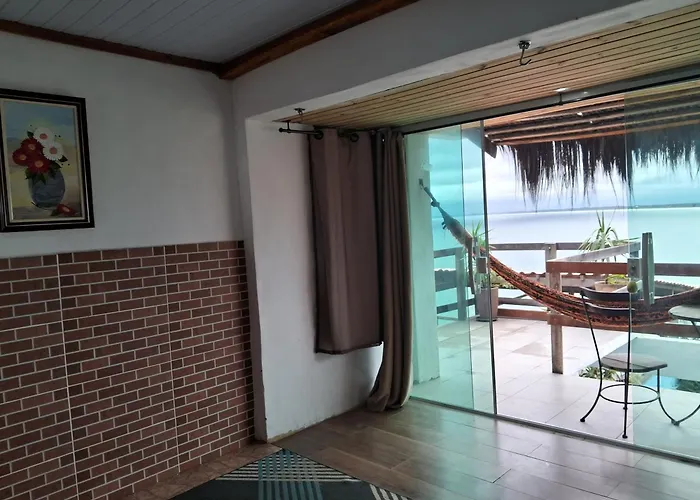 Pousada Marambaia Café - Praiana, econômica, Com café da manhã, piscina e hidromassagem ao ar livre - Frente para o mar