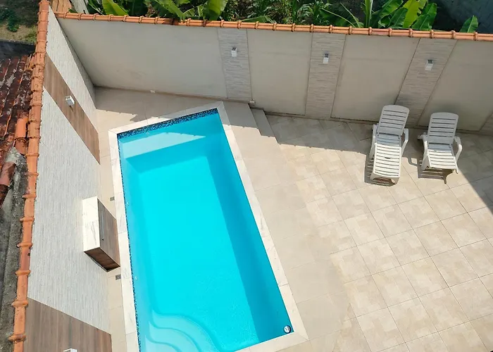 Flats e kitnets em Caraguatatuba Recanto Família Gomes com piscina, cozinha, garagem, seu pet é bem vindo